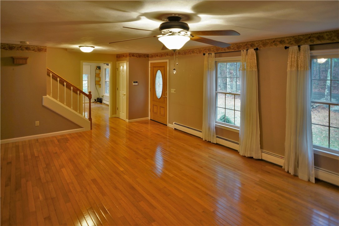 86 Log Road North Smithfield, RI 02830 - Photo 7 of 34 LIVING ROOM FACING FRONT ENTRANCE