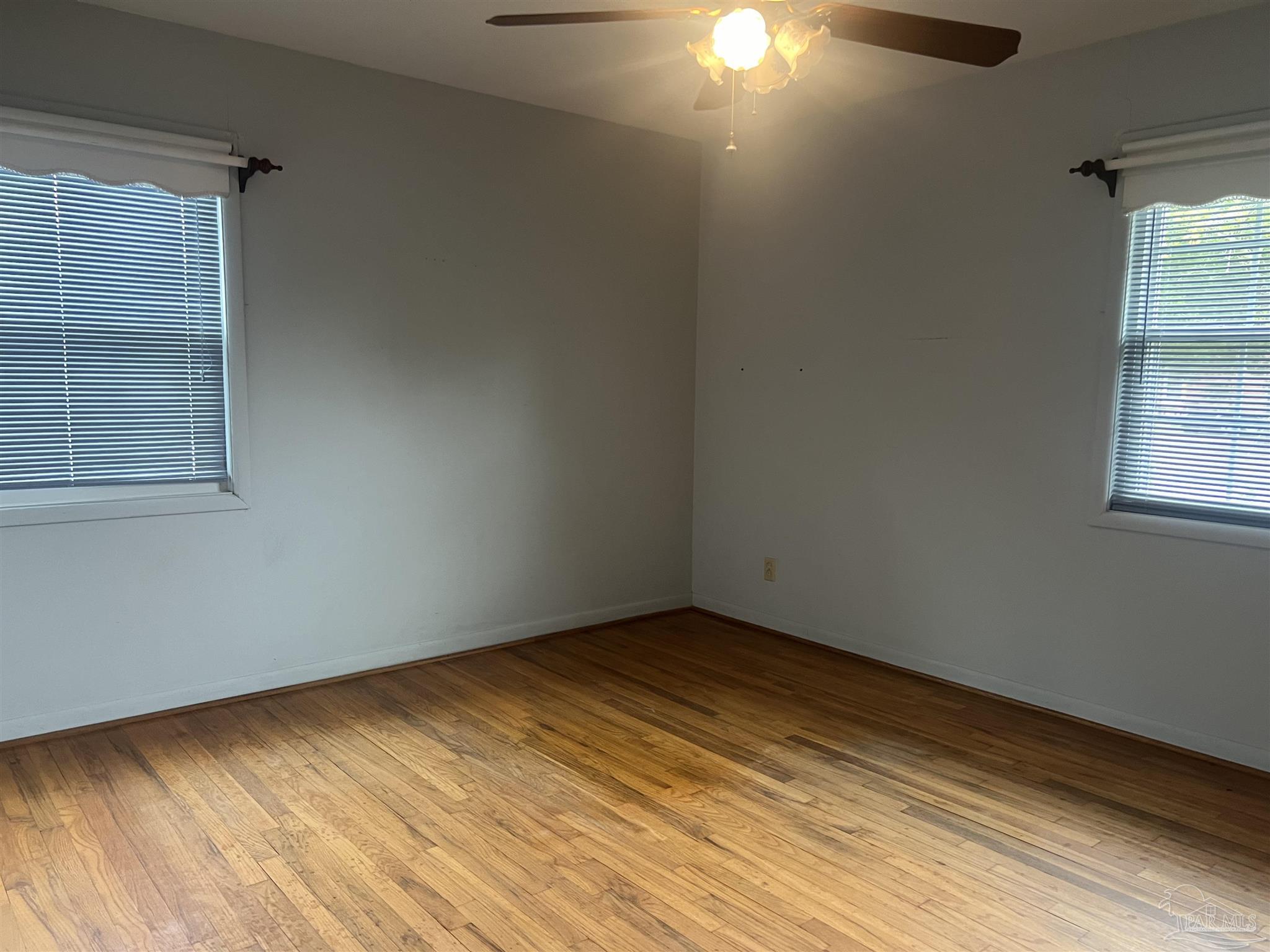 6020 Hilltop Road Pensacola, FL 32504 - Photo 13 of 27 an empty room with a window