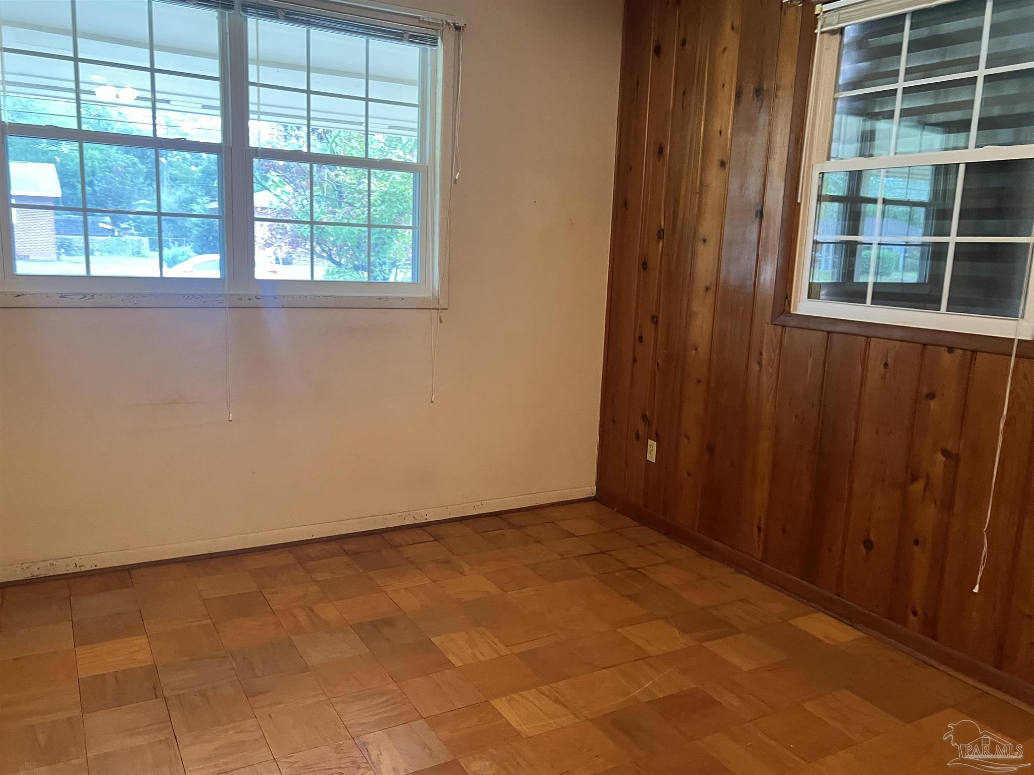 6020 Hilltop Road Pensacola, FL 32504 - Photo 16 of 27 an empty room with windows