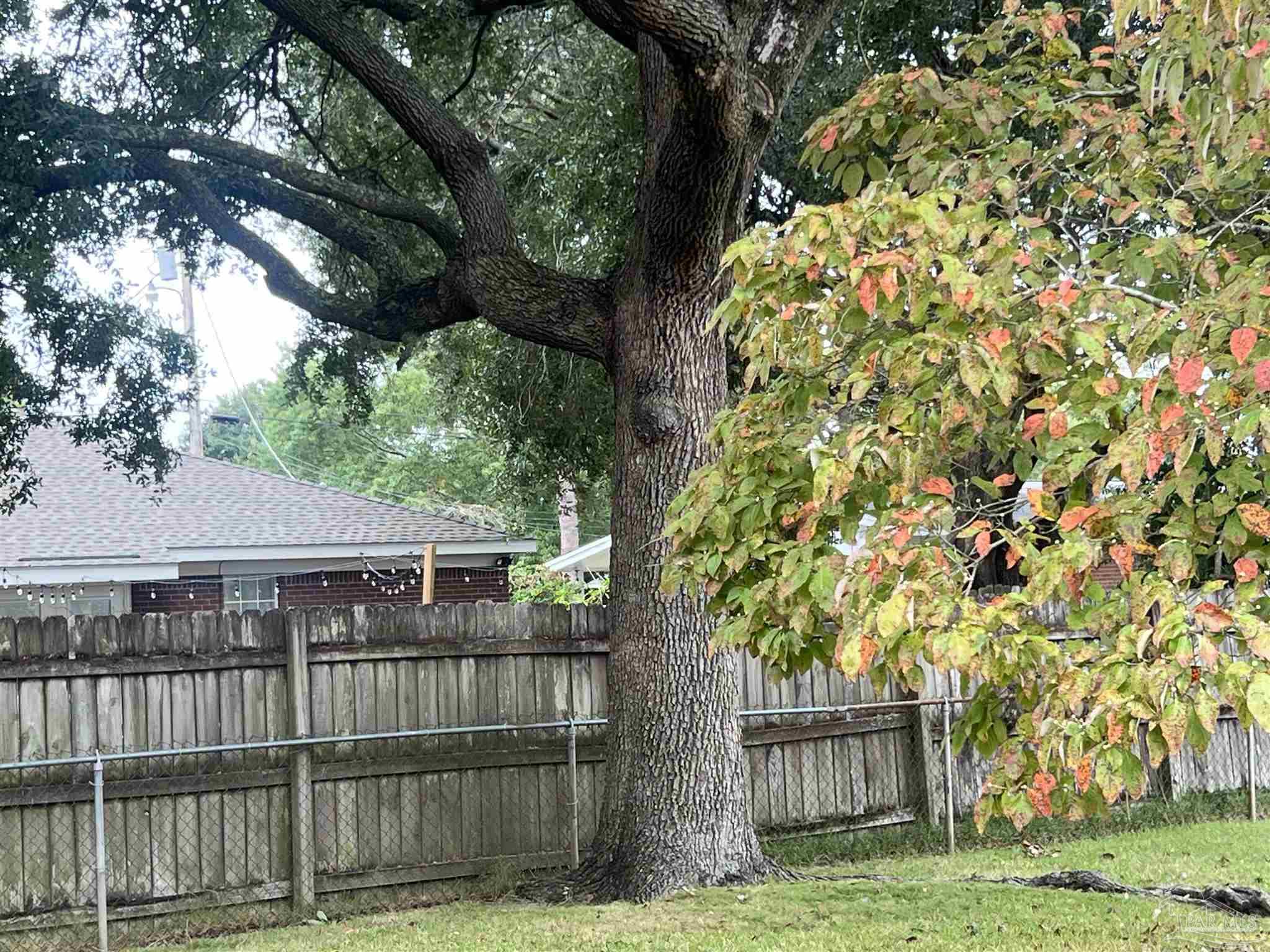 6020 Hilltop Road Pensacola, FL 32504 - Photo 25 of 27 a view of house with a yard