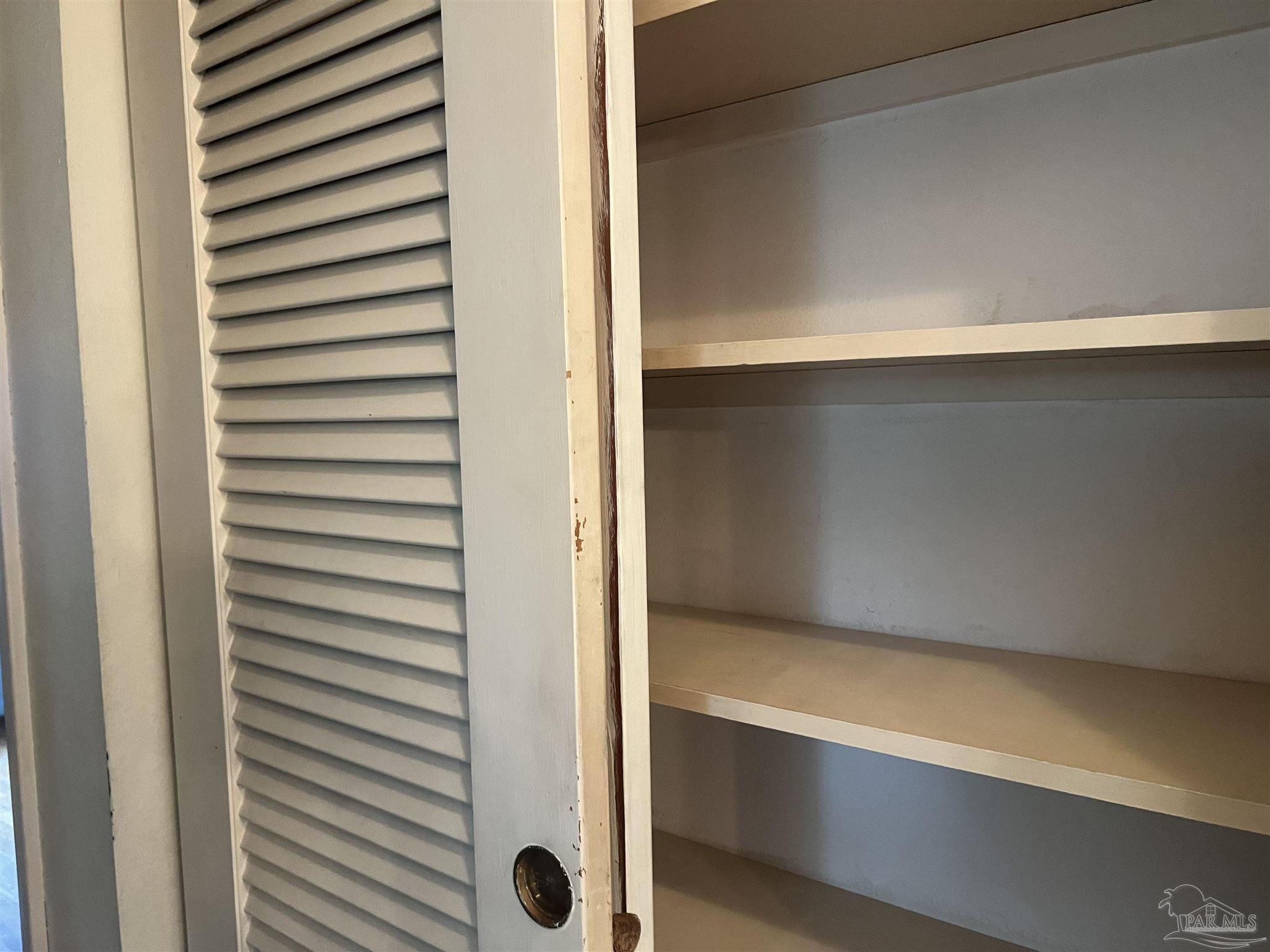 6020 Hilltop Road Pensacola, FL 32504 - Photo 10 of 27 a view of a room with a door