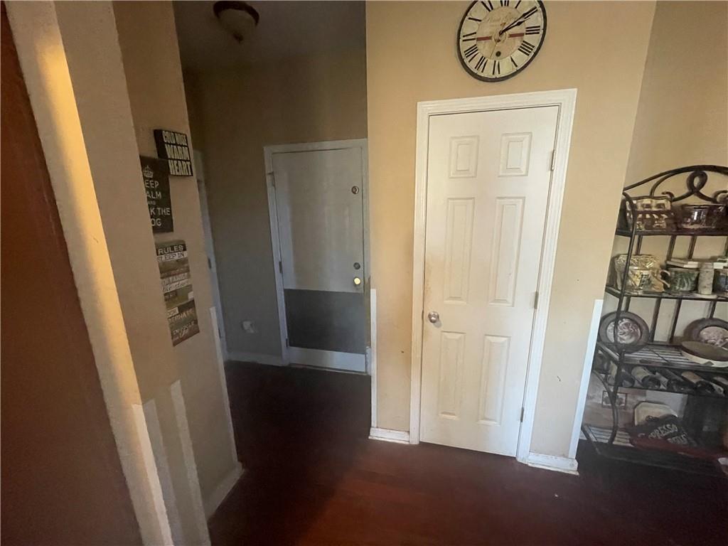 802 Bishops Run Lane Mableton, GA 30126 - Photo 5 of 8 a view of a hallway with wooden floor and closet