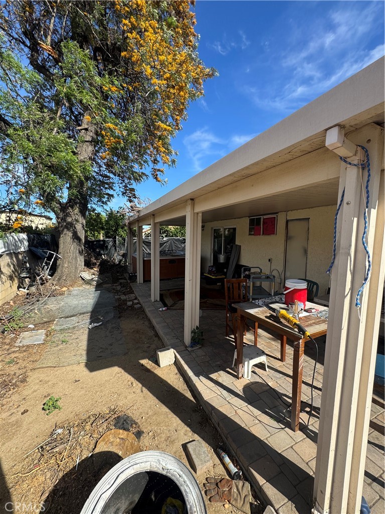 1266 Lorraine Place Rialto, CA 92376 - Photo 7 of 15 a view of a chairs and tables in patio