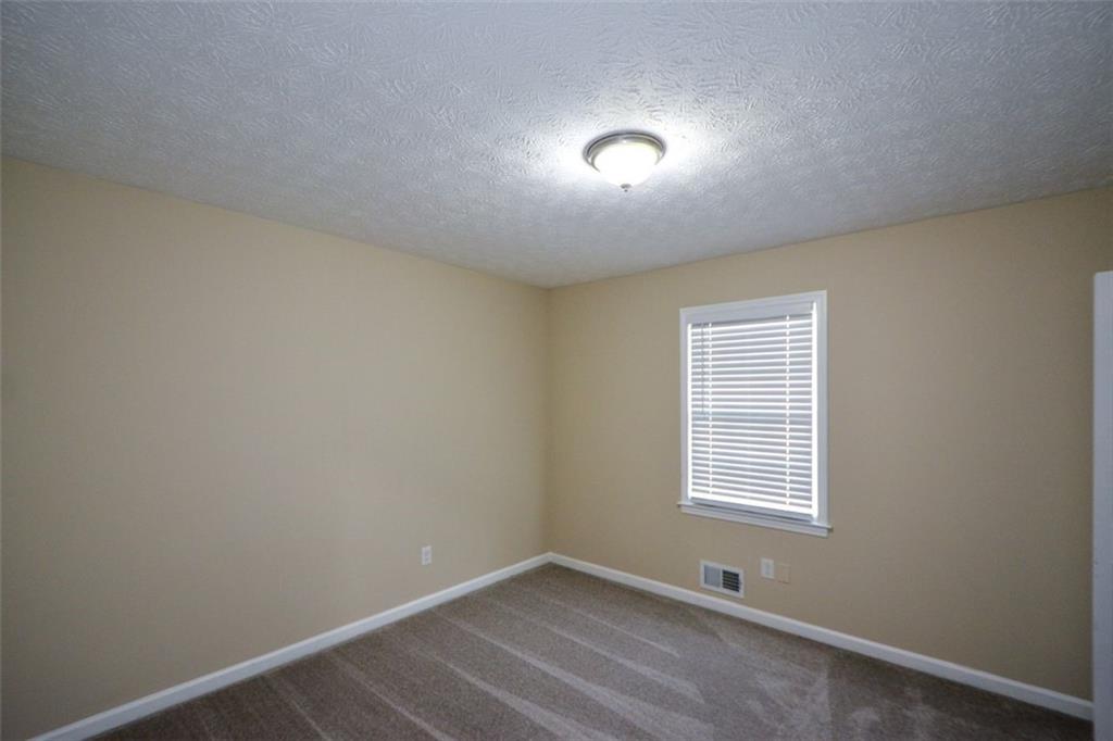 2895 Fairview Road Covington, GA 30016 - Photo 18 of 31 an empty room with windows