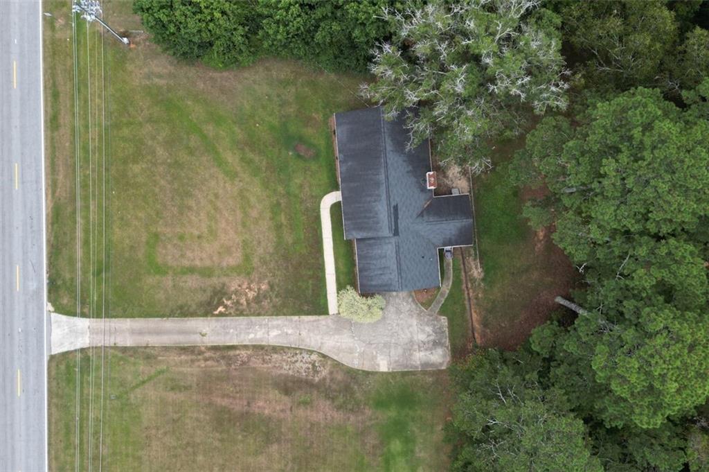 2895 Fairview Road Covington, GA 30016 - Photo 30 of 31 an aerial view of a house with a yard