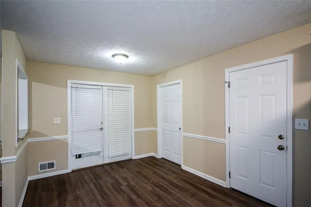 an empty room with closet