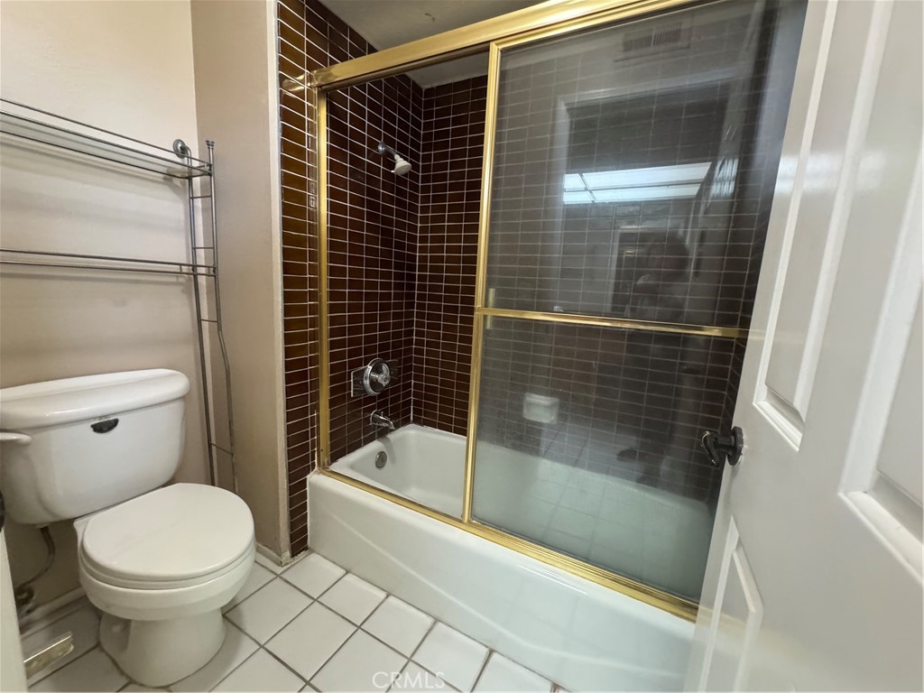 6 Recodo Irvine, CA 92620 - Photo 23 of 33 a bathroom with a toilet and shower