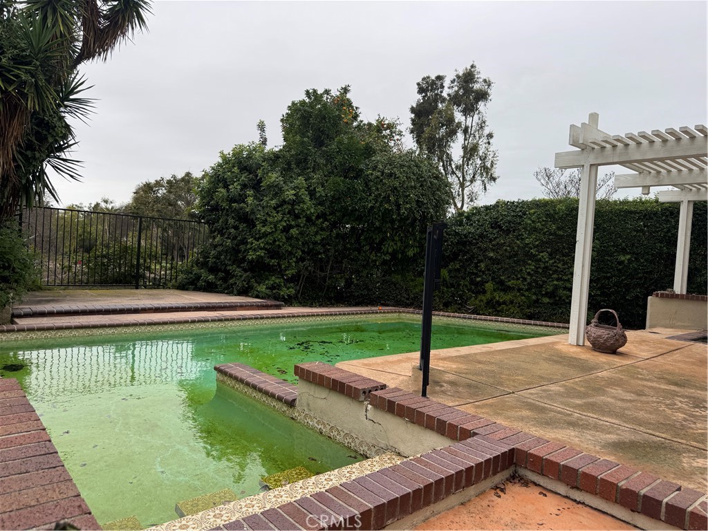 6 Recodo Irvine, CA 92620 - Photo 24 of 33 a view of a swimming pool with a patio