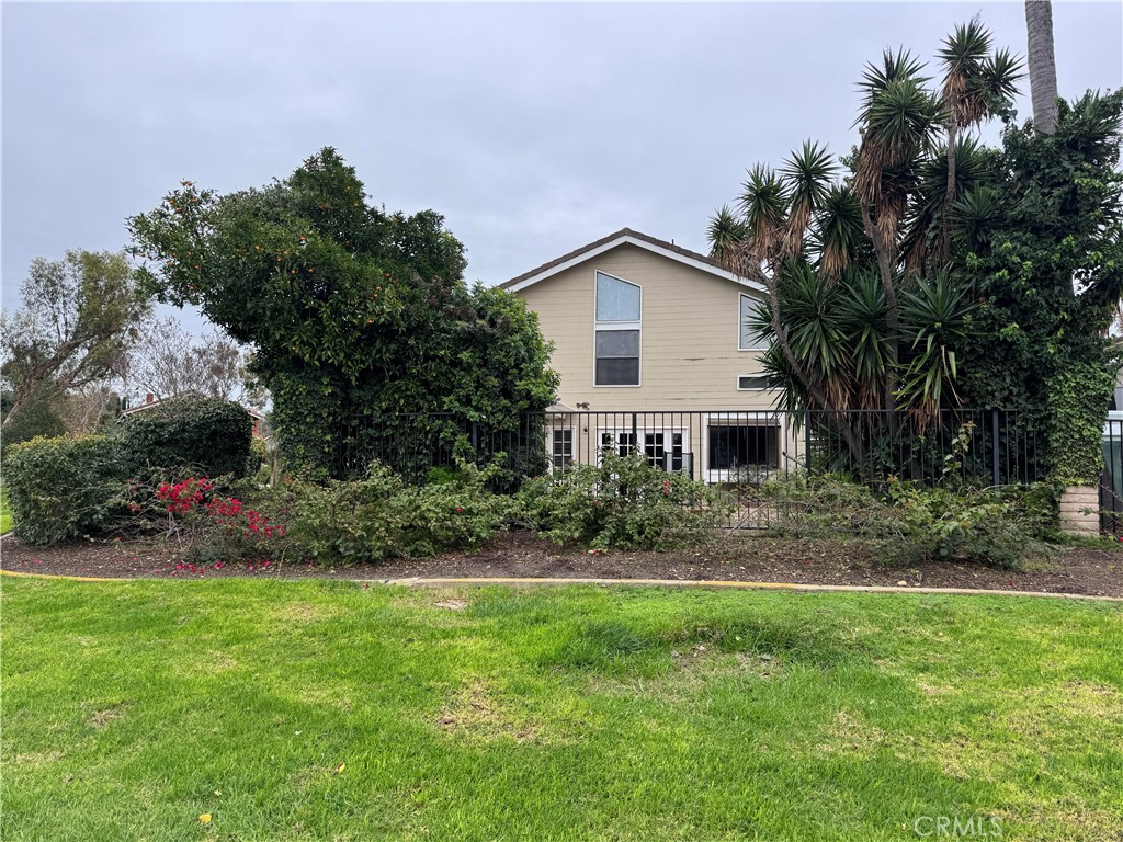 6 Recodo Irvine, CA 92620 - Photo 28 of 33 a view of a house with a yard and a garden
