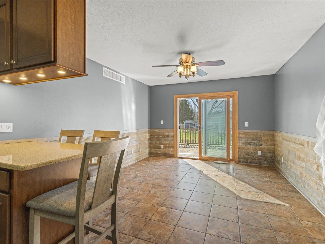 536 Carpenter Street Belvidere, IL 61008 - Photo 14 of 39 a view of a dining room with a table and chairs