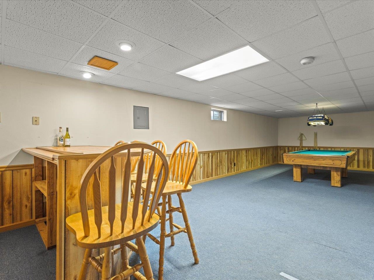 536 Carpenter Street Belvidere, IL 61008 - Photo 28 of 39 a living room with a table and gym equipment