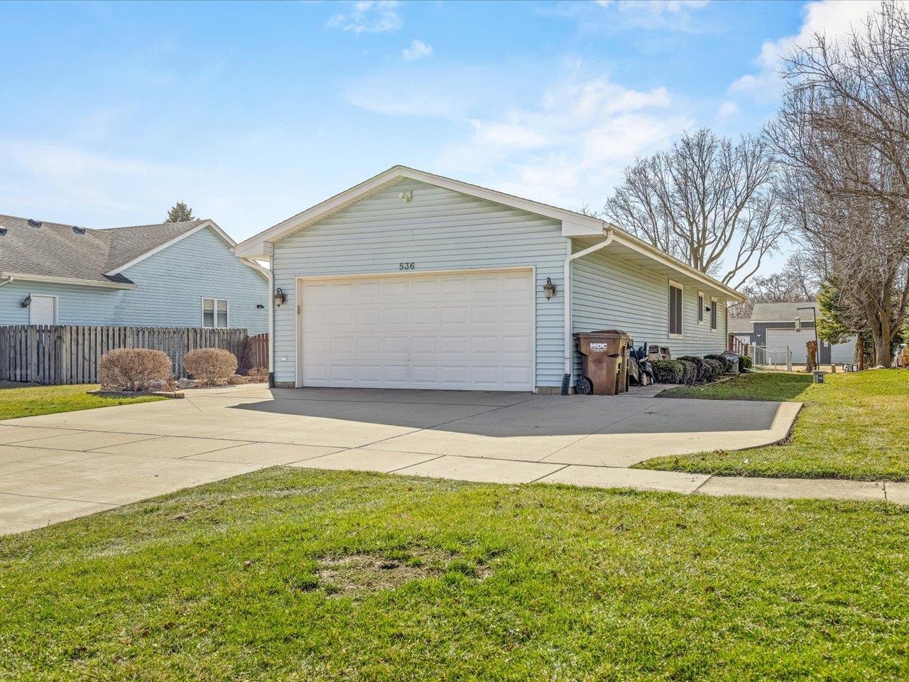 536 Carpenter Street Belvidere, IL 61008 - Photo 4 of 39 a front view of a house with a yard and garage