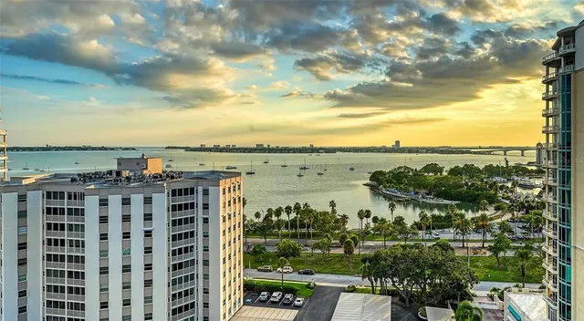 an aerial view of building with a yard