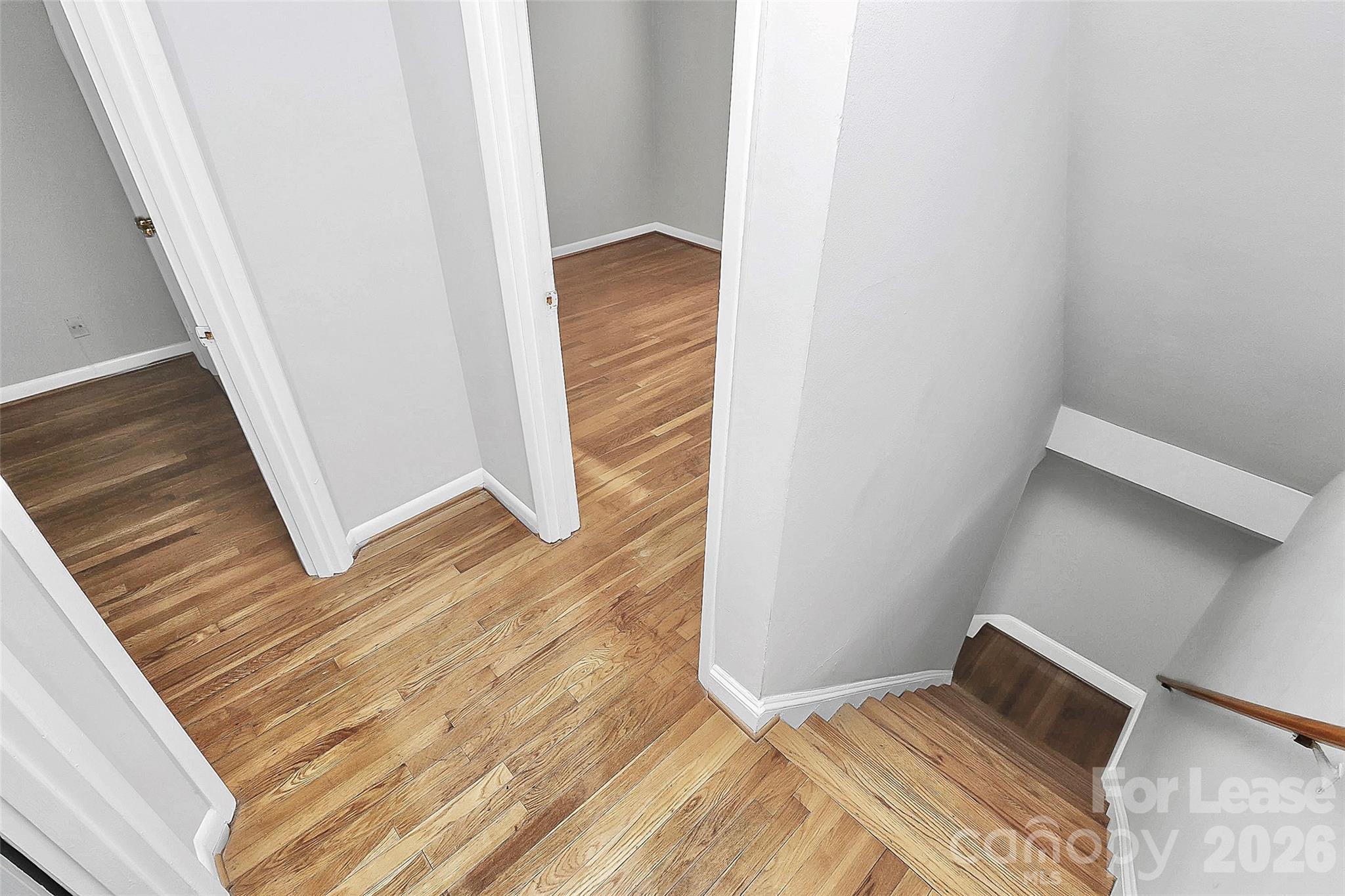 4220 Castleton Road Charlotte, NC 28211 - Photo 14 of 17 a view of an empty room and wooden floor