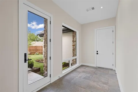 a view of livingroom with front door