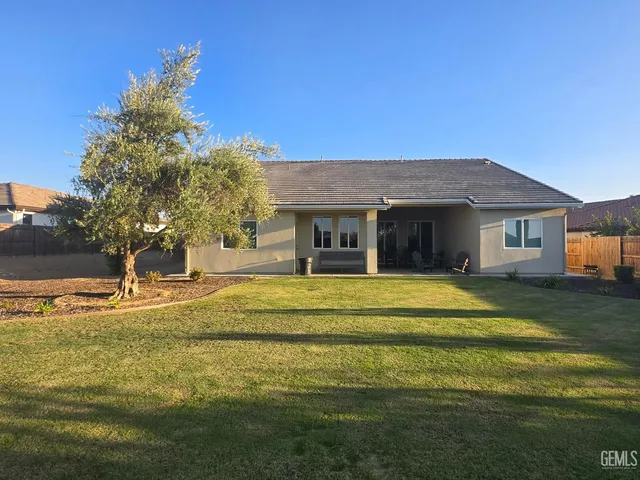 a view of a house with a swimming pool
