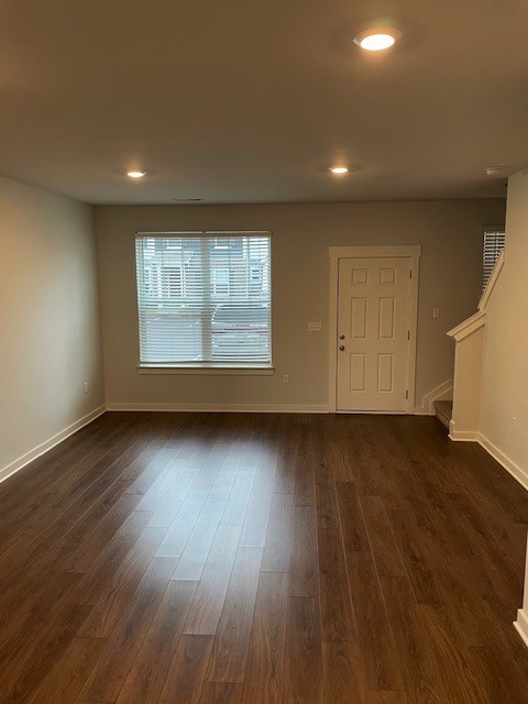 1741 Frodo Way Murfreesboro, TN 37128 - Photo 4 of 10 an empty room with wooden floor and windows