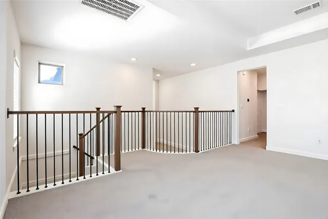 a living room with furniture or couch and a flat screen tv