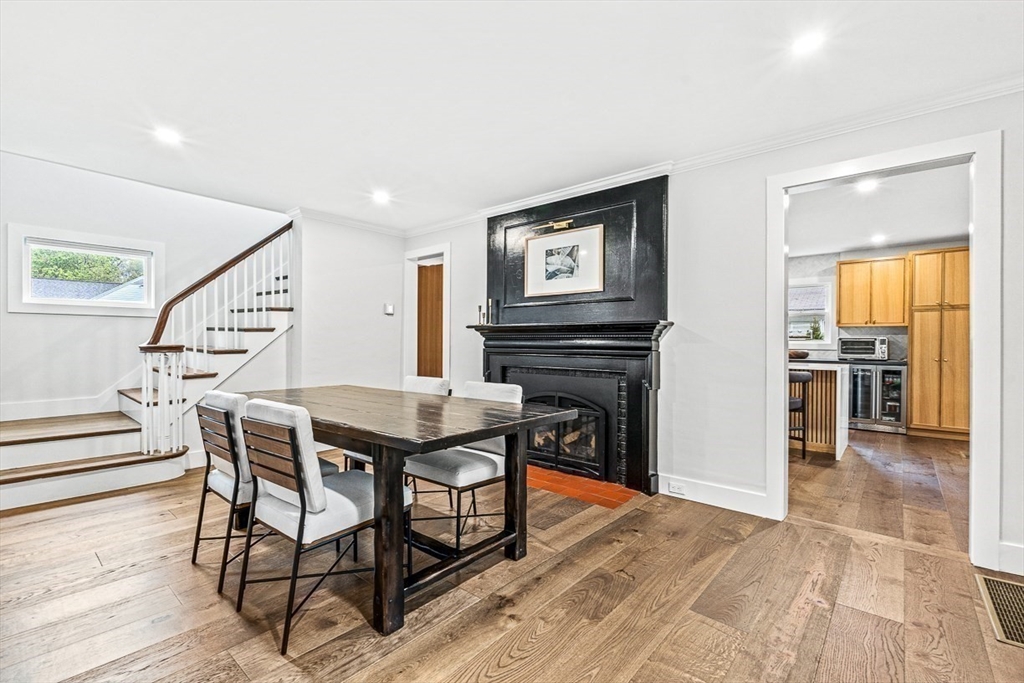 15 Rustic Road Stoneham, MA 02180 - Photo 12 of 42 a dining room with furniture and wooden floor