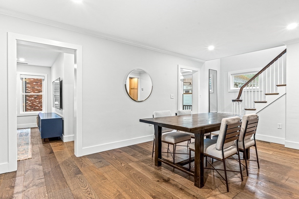 15 Rustic Road Stoneham, MA 02180 - Photo 14 of 42 a view of a dining room with furniture and a chandelier