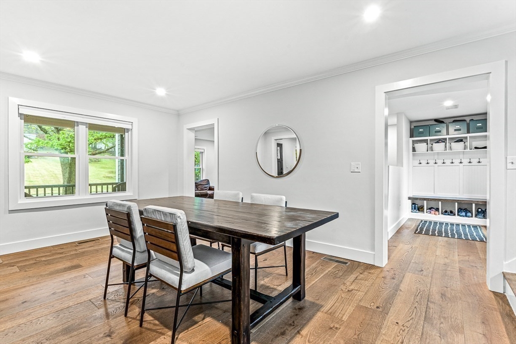 15 Rustic Road Stoneham, MA 02180 - Photo 15 of 42 a view of a dining room with furniture window and wooden floor