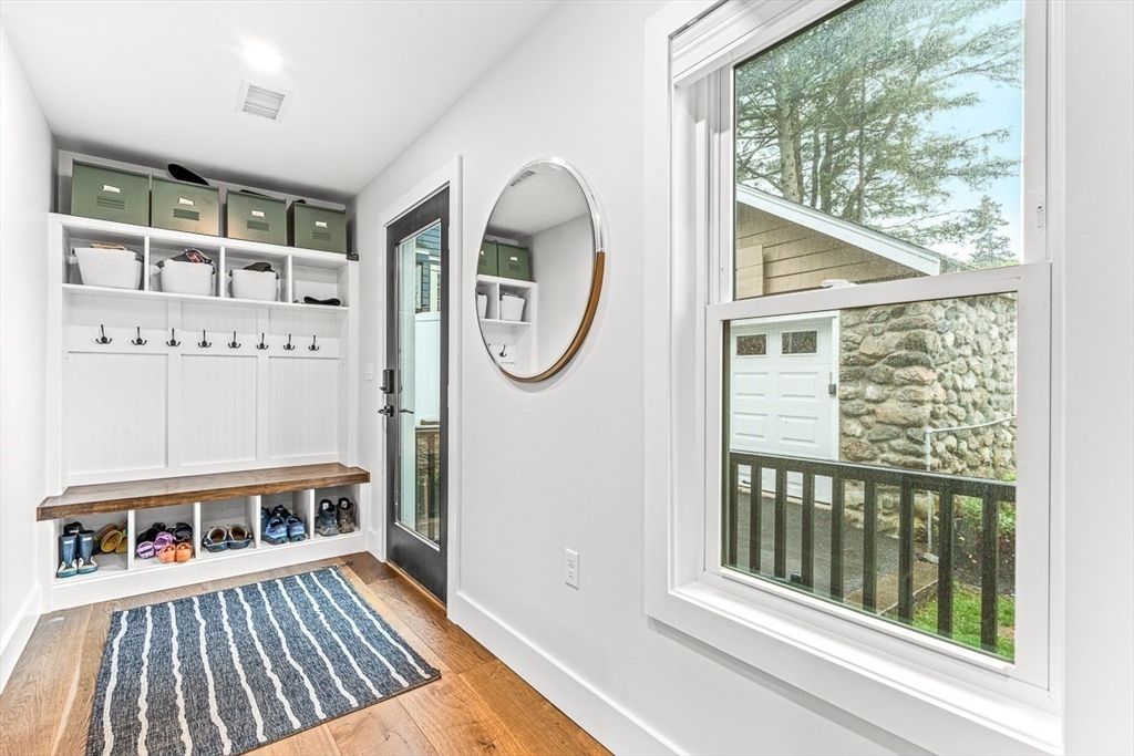 15 Rustic Road Stoneham, MA 02180 - Photo 16 of 42 a view of a bedroom with wooden floor