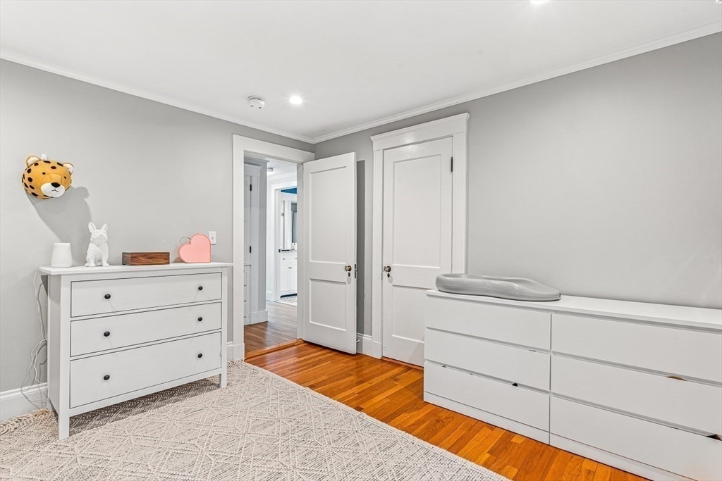 15 Rustic Road Stoneham, MA 02180 - Photo 25 of 42 a room with a dresser and a mirror