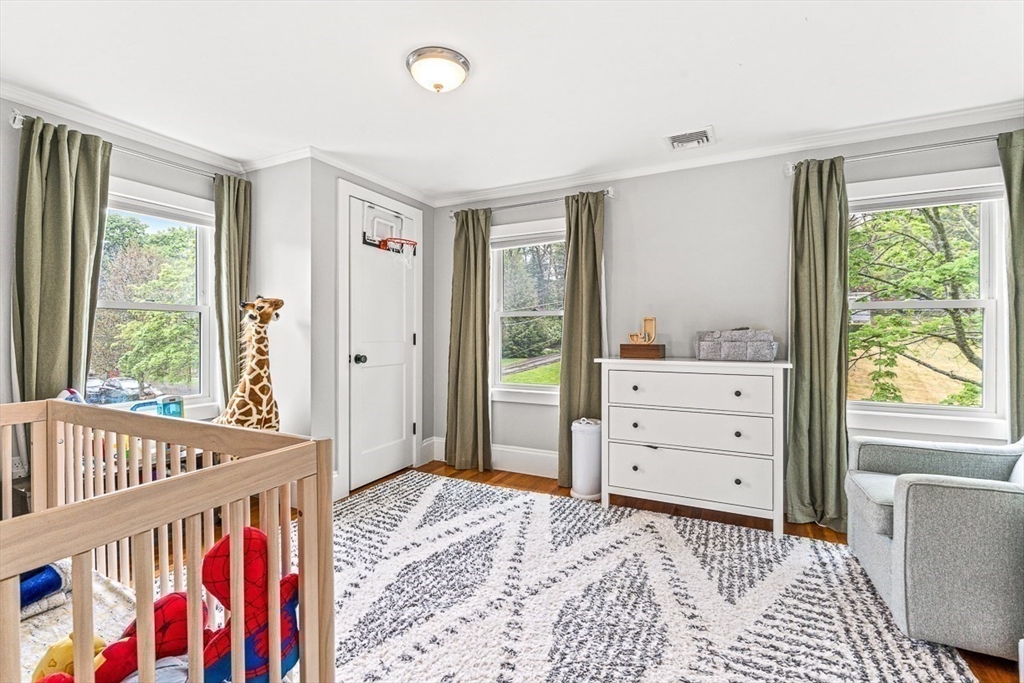 15 Rustic Road Stoneham, MA 02180 - Photo 31 of 42 a bedroom with furniture and a window