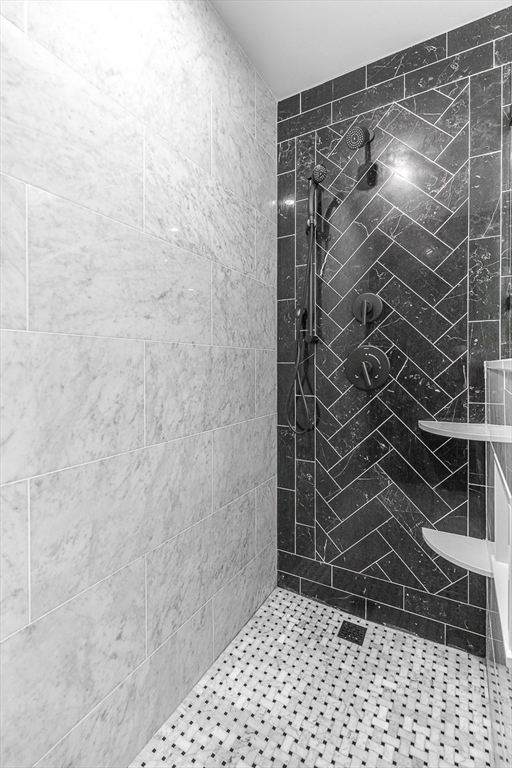 15 Rustic Road Stoneham, MA 02180 - Photo 34 of 42 a bathroom with a shower