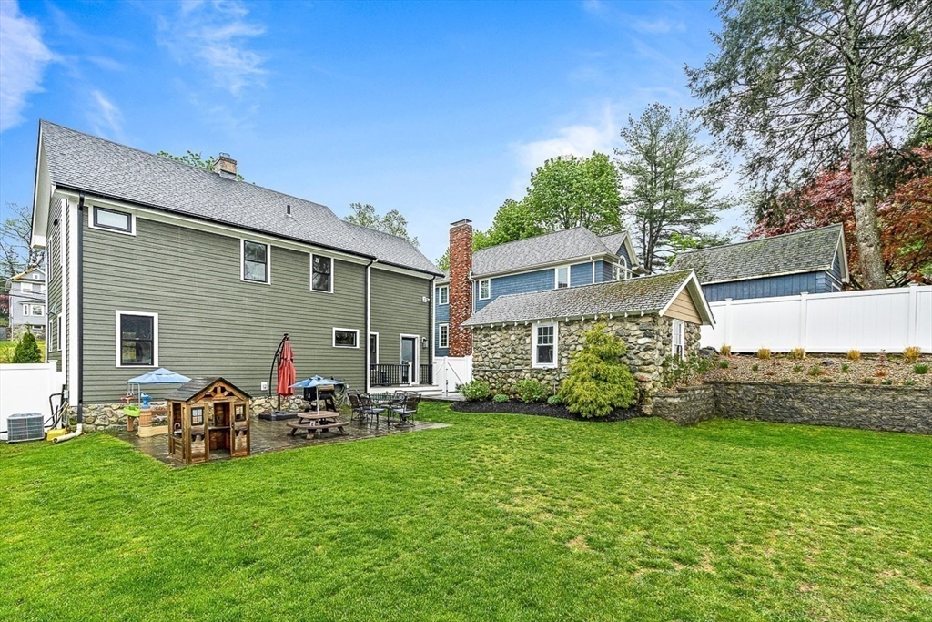15 Rustic Road Stoneham, MA 02180 - Photo 40 of 42 a view of a house with backyard