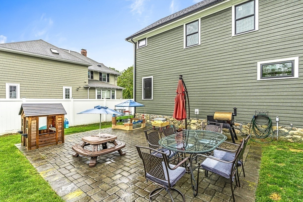 15 Rustic Road Stoneham, MA 02180 - Photo 42 of 42 a view of backyard of house with seating space