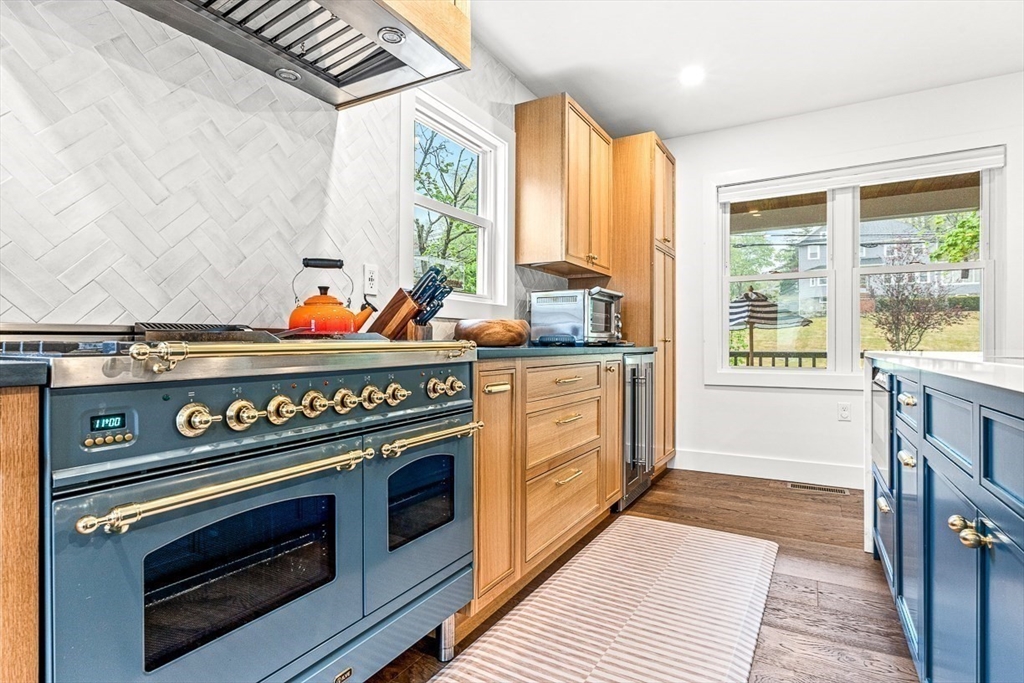 15 Rustic Road Stoneham, MA 02180 - Photo 7 of 42 a kitchen with a stove and a microwave