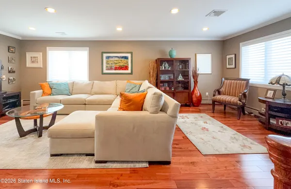 a kitchen with stainless steel appliances a refrigerator sink and microwave