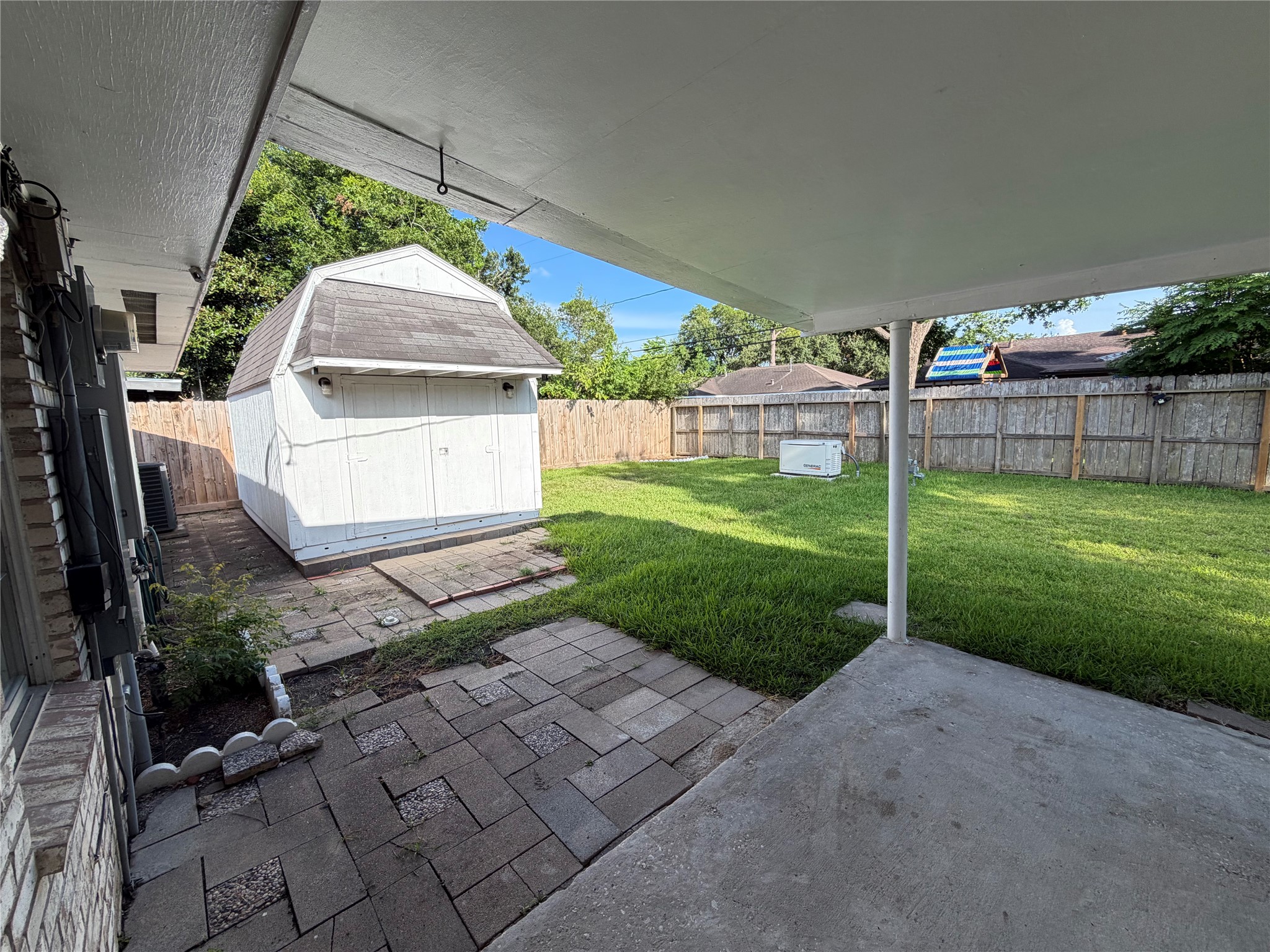 7603 Grape Street Houston, TX 77074 - Photo 7 of 25 Outdoor Patio with Shed