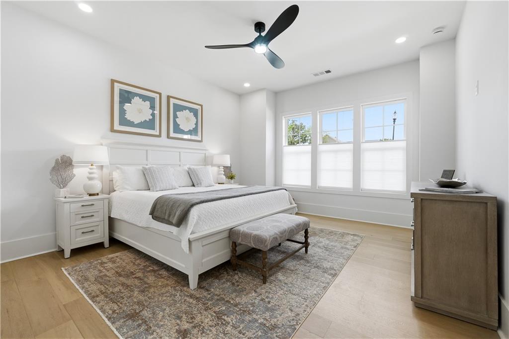 237 Lask Lane Milton, GA 30004 - Photo 28 of 63 a spacious bedroom with a bed and a window