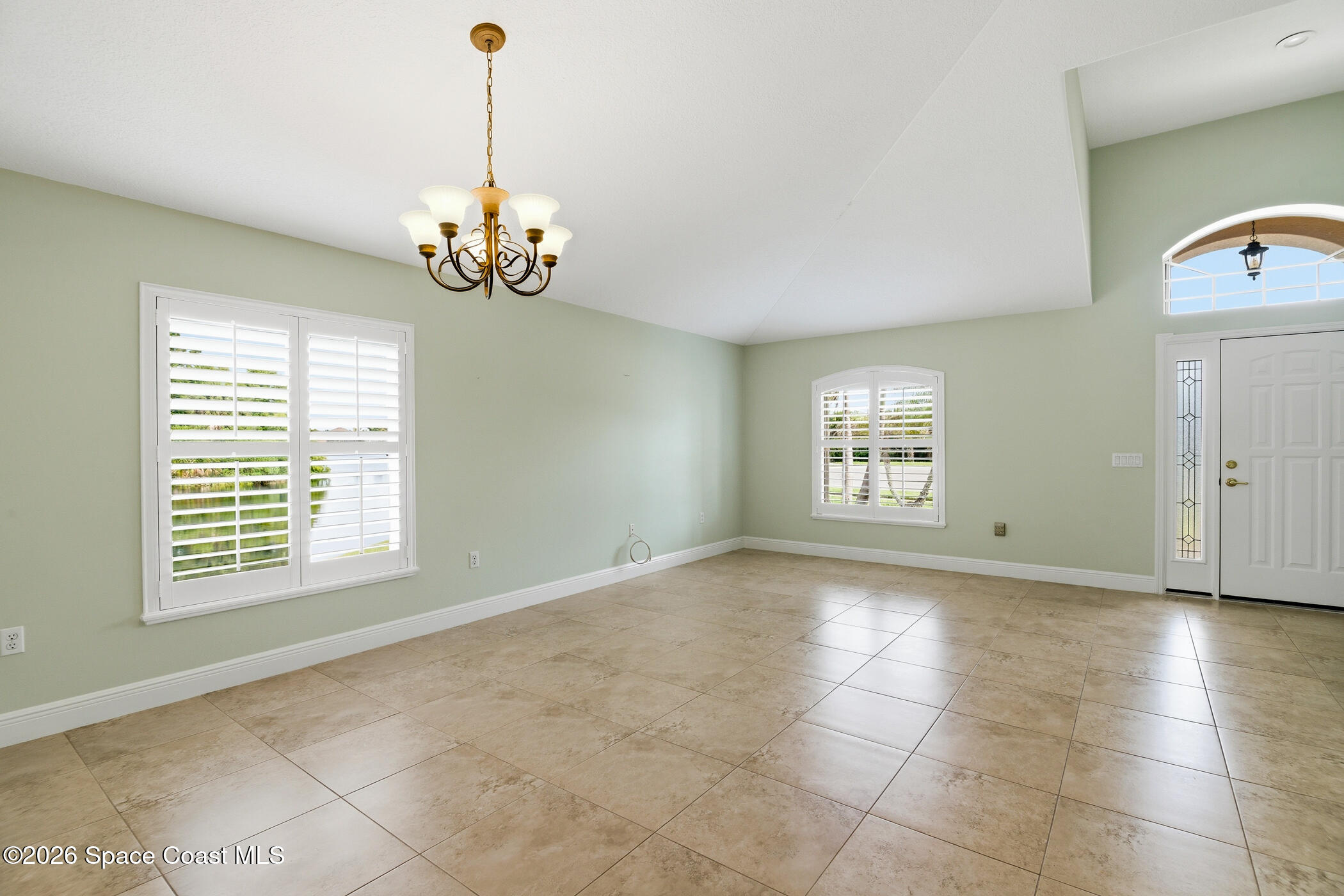 1785 Boca Rio Drive Melbourne, FL 32940 - Photo 9 of 66 Living & Dining Area
