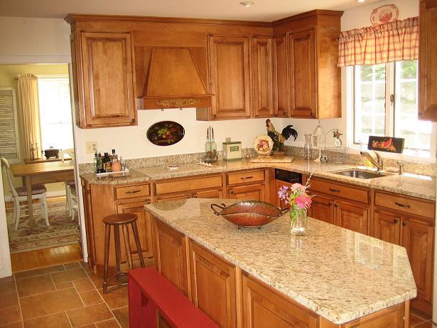 2514 Ridge Circle Cresco, PA 18326 - Photo 3 of 13 a kitchen with stainless steel appliances a sink a stove and a wooden cabinets