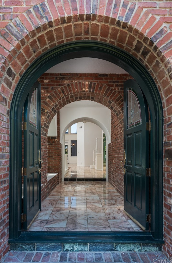 23 Summerside Coto de Caza, CA 92679 - Photo 2 of 34 a front view of a house with swimming pool having outdoor seating