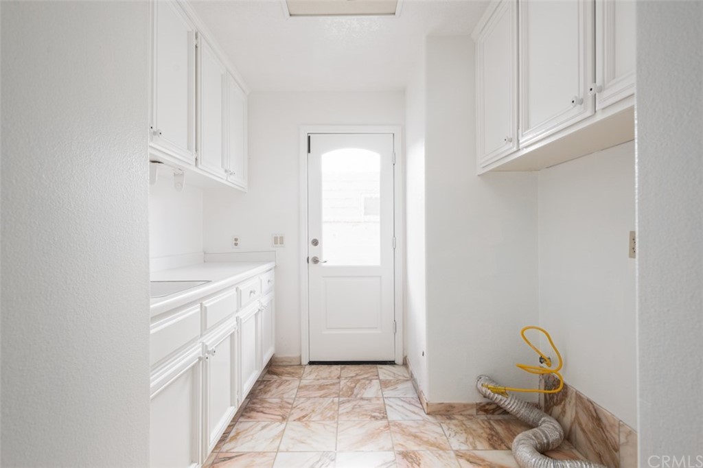 23 Summerside Coto de Caza, CA 92679 - Photo 15 of 34 a view of an empty room with wooden floor and a window