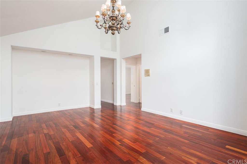 23 Summerside Coto de Caza, CA 92679 - Photo 25 of 34 an empty room with wooden floor and windows