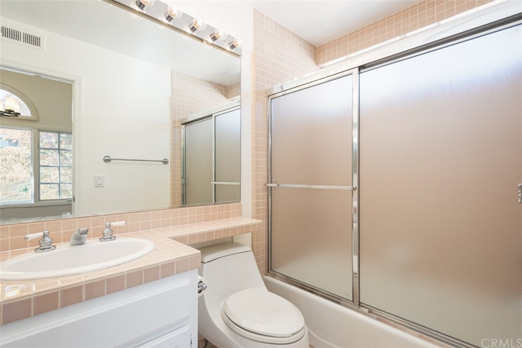 23 Summerside Coto de Caza, CA 92679 - Photo 29 of 34 a living room with large windows