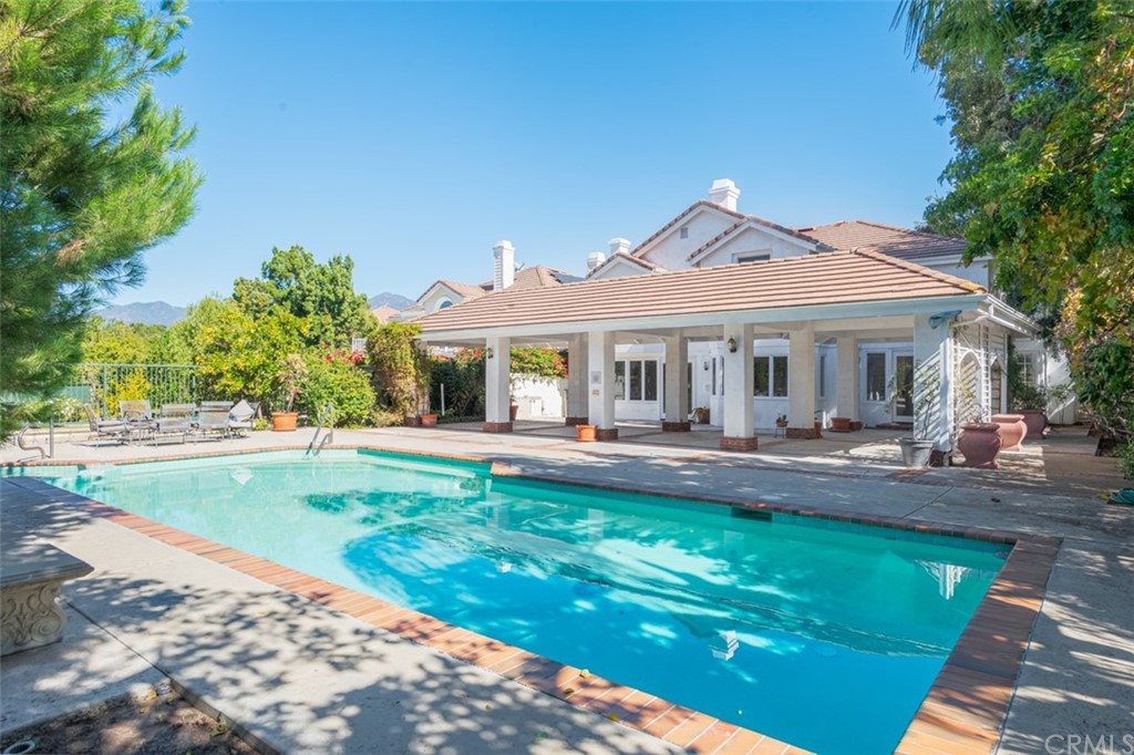 23 Summerside Coto de Caza, CA 92679 - Photo 32 of 34 a view of a house with backyard patio and swimming pool