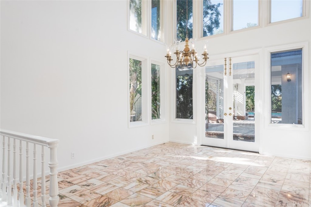 23 Summerside Coto de Caza, CA 92679 - Photo 5 of 34 a view of a chandelier fan and fire place
