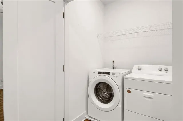 a utility room with dryer and washer