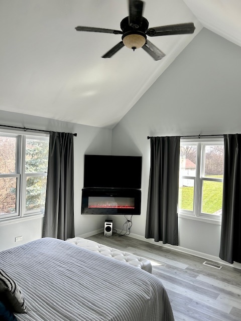 6414 Suttondale Road Huntley, IL 60142 - Photo 13 of 24 a bedroom with a bed and a flat screen tv