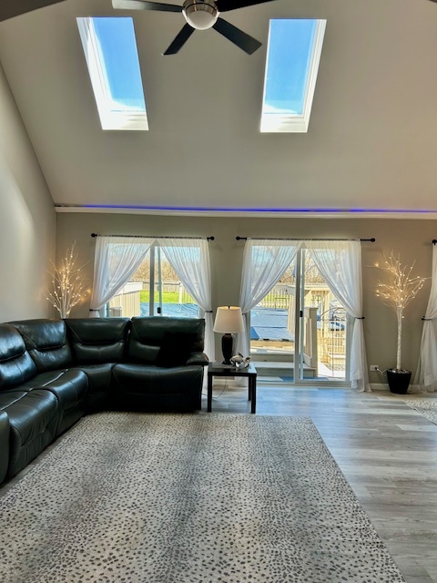 6414 Suttondale Road Huntley, IL 60142 - Photo 7 of 24 a living room with furniture and a large window