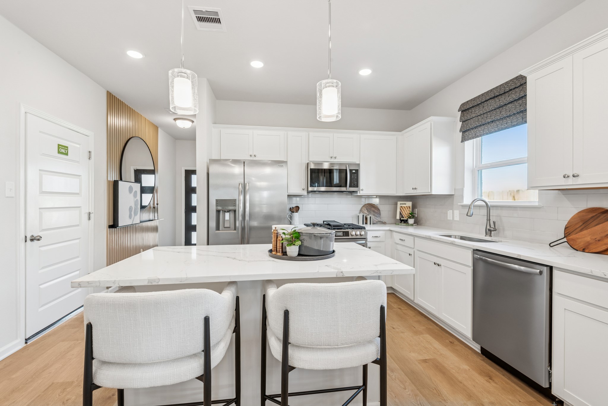 33006 School Hl Road Fulshear, TX 77441 - Photo 4 of 20 The Kettering II- Kitchen. Staged model home shown for illustration only; actual features, colors, and upgrades may vary.