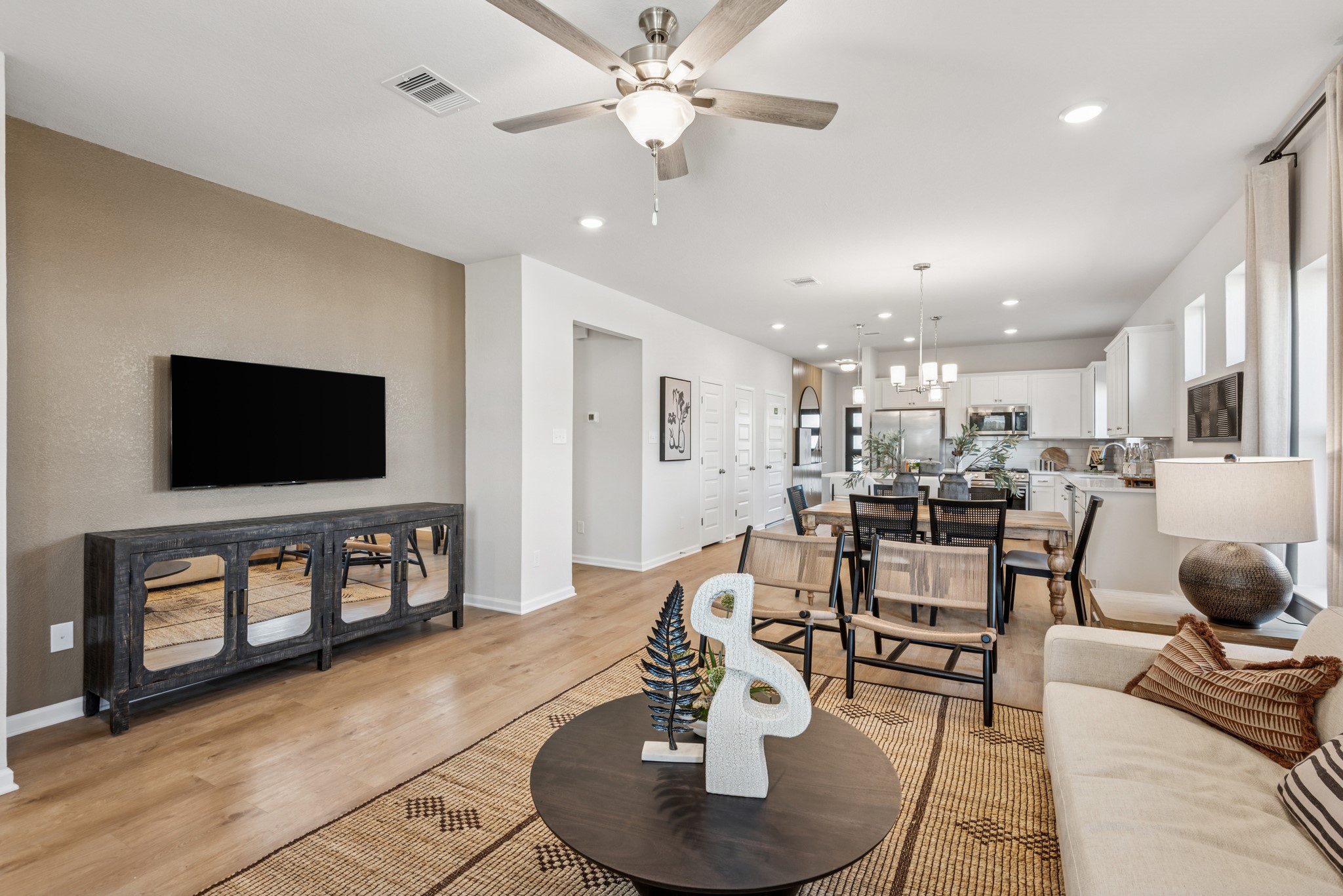 33006 School Hl Road Fulshear, TX 77441 - Photo 7 of 20 The Kettering II- Family Room. Staged model home shown for illustration only; actual features, colors, and upgrades may vary.