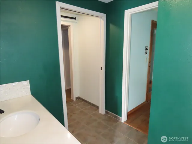 an aerial view of house with yard swimming pool and outdoor seating