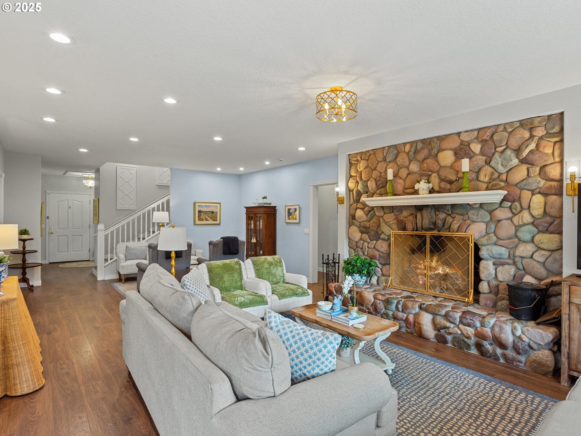 23751 Schultz Road Northeast Aurora, OR 97002 - Photo 16 of 48 a living room with furniture and a fireplace